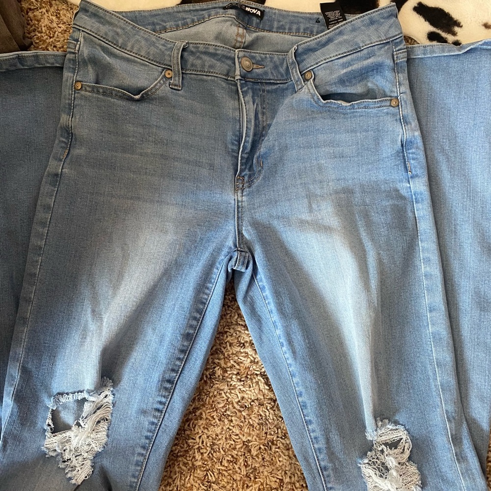 Fashion Nova Sky Blue Distressed Flare Jeans